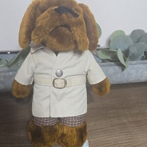 Brown Stuffed Dog in Beige Outfit